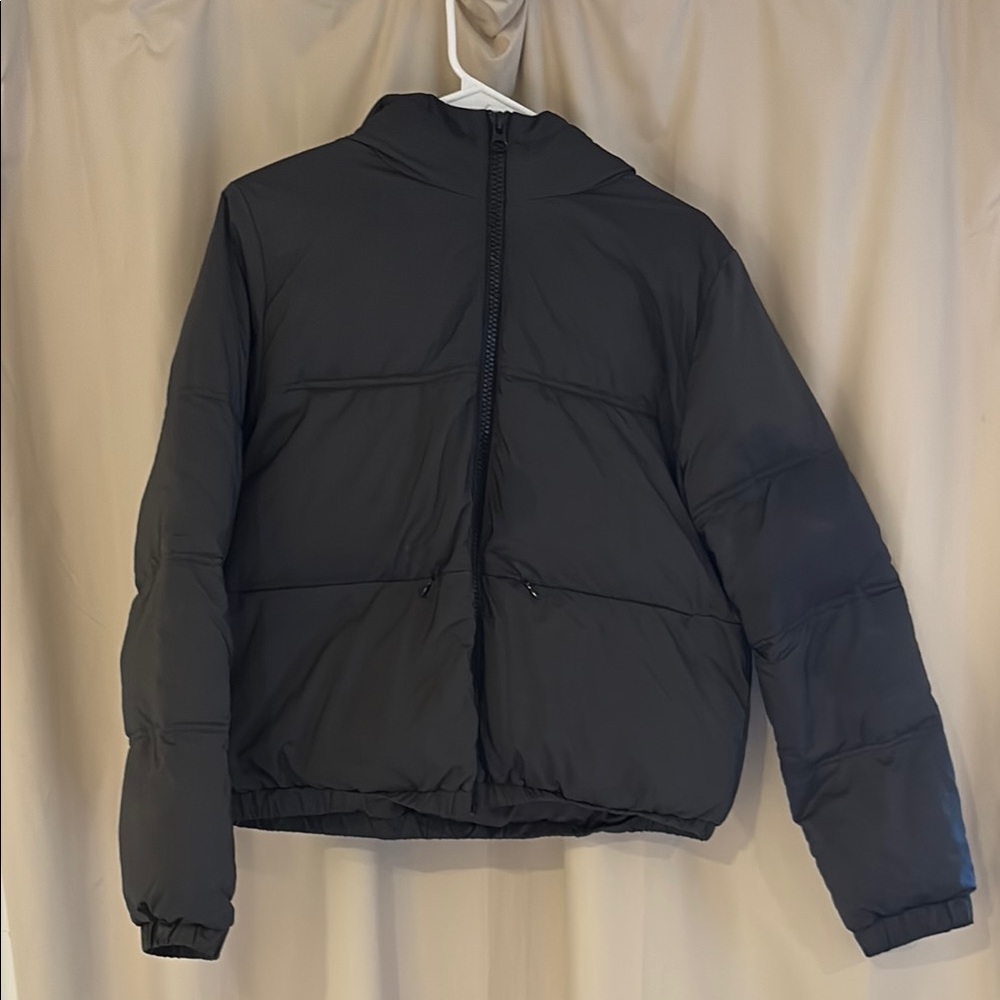 Divided Black Puffer Jacket with High Collar and Zipper Closure